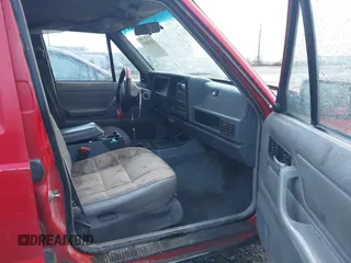 1996 Jeep Cherokee Sport with VIN 1J4FJ68S4TL244893, listed as a IAAI auction lot 41190369 with 192,459 mi miles and . Bid and sale history available at DreamBid. Image 5.
