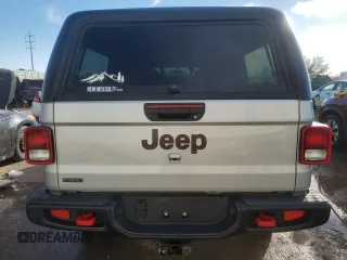 2023 Jeep Gladiator Rubicon FarOut z VIN 1C6JJTBM2PL587711, wystawiony jako Copart lot #77280214 z przebiegiem Nie podano mil oraz Szkoda całkowita • Salvage title. Historia ofert i sprzedaży dostępna na DreamBid. Obrazek 6.