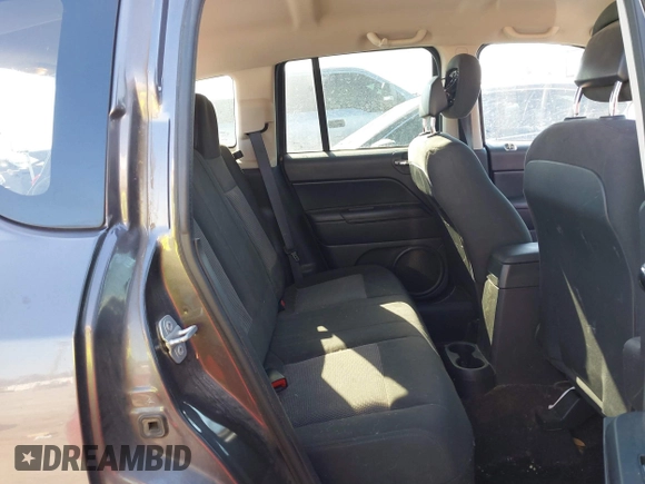 2015 Jeep Compass Sport with VIN 1C4NJCBBXFD274472, listed as a IAAI auction lot 41629585 with 124,407 mi miles. Bid and sale history available at carsss.com. Image 8.