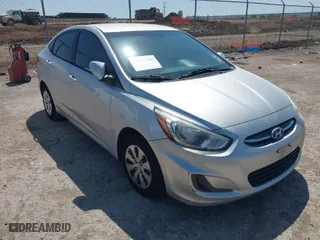 2015 Hyundai Accent GLS with VIN KMHCT4AEXFU913710, listed as a IAAI auction lot 41987766 with 131,142 mi miles. Bid and sale history available at carsss.com. Image 1.