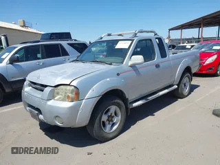 2001 Nissan Frontier SE Desert Runner z VIN 1N6ED26T51C362345, wystawiony jako IAAI lot #42324055 z przebiegiem 233 809 mil mil oraz . Historia ofert i sprzedaży dostępna na DreamBid. Obrazek 2.