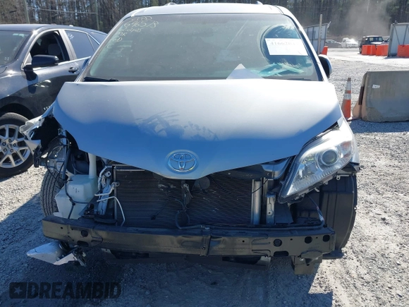 2016 Toyota Sienna LE AAS with VIN 5TDKK3DC6GS696573, listed as a IAAI auction lot 41662041 with 75,363 mi miles. Bid and sale history available at carsss.com. Image 6.