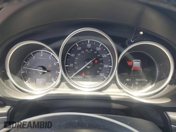2018 Mazda CX-5 Grand Touring with VIN JM3KFADM3J1389911, listed as a Copart auction lot 60530295 with 103,177 mi miles and Salvage title. Bid and sale history available at DreamBid. Image 9.