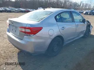 2018 Subaru Impreza with VIN 4S3GKAA67J3622063, listed as a IAAI auction lot 41318036 with 75,713 mi miles and . Bid and sale history available at DreamBid. Image 4.