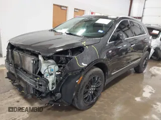 2018 Cadillac XT5 Luxury FWD with VIN 1GYKNCRS8JZ184322, listed as a IAAI auction lot 41225319 with 97,729 mi miles and . Bid and sale history available at carsss.com. Image 2.
