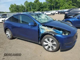 2024 Tesla Model Y Long Range with VIN 7SAYGDEE4RF032154, listed as a Copart auction lot 61973635 with 10,022 mi miles and Salvage title. Bid and sale history available at DreamBid. Image 4.