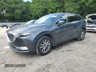 2019 Mazda CX-9 Touring z VIN JM3TCACY6K0334121, wystawiony jako Copart lot #64901735 z przebiegiem 112 328 mil mil oraz Szkoda całkowita • Salvage title. Historia ofert i sprzedaży dostępna na DreamBid. Obrazek 1.