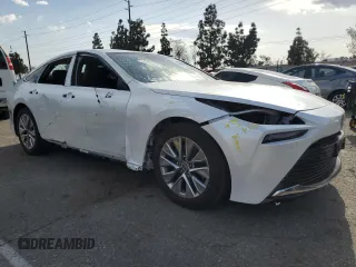 2023 Toyota Mirai XLE with VIN JTDAAAAA4PA009853, listed as a Copart auction lot 51687695 with 27,638 mi miles and Salvage Title. Bid and sale history available at DreamBid. Image 4.
