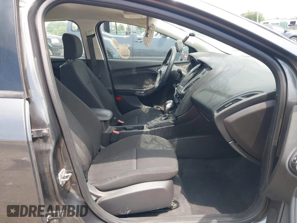 2016 Ford Focus SE with VIN 1FADP3F21GL387227, listed as a IAAI auction lot 42438650 with 59,969 mi miles and . Bid and sale history available at DreamBid. Image 5.