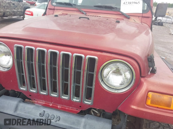 2000 Jeep Wrangler Sport with VIN 1J4FA49S2YP764321, listed as a IAAI auction lot 42385965 with Not provided miles and . Bid and sale history available at DreamBid. Image 6.