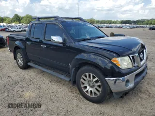 2011 Nissan Frontier SL with VIN 1N6AD0ERXBC440046, listed as a Copart auction lot 61645595 with 130,639 mi miles and Salvage title. Bid and sale history available at DreamBid. Image 4.