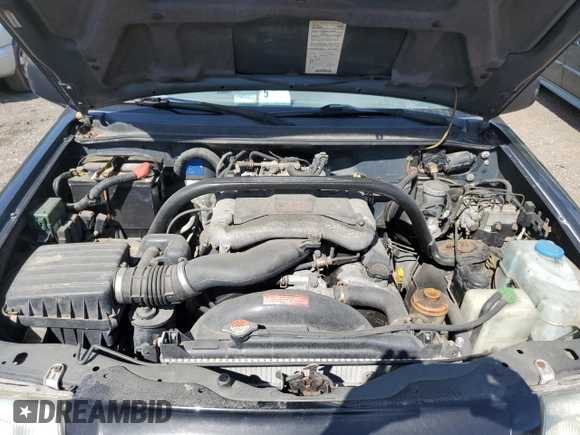 1999 Suzuki Grand Vitara z VIN JS3TD62VXX4100236, wystawiony jako Copart lot #57228075 z przebiegiem Nie podano mil oraz Szkody całkowita. Historia ofert i sprzedaży dostępna na DreamBid. Obrazek 12.