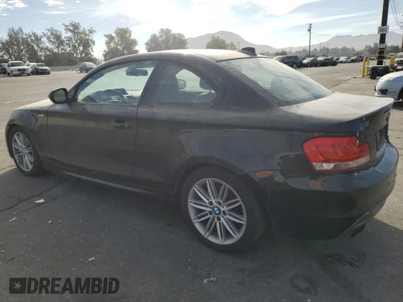 2012 BMW 1 Series 128i with VIN WBAUP9C55CVL91384, listed as a Copart auction lot 77684304 with 201,402 mi miles and Clean title. Bid and sale history available at DreamBid. Image 2.