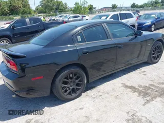 2013 Dodge Charger Police z VIN 2C3CDXAT1DH716317, wystawiony jako IAAI lot #42277270 z przebiegiem 213 722 mil mil oraz . Historia ofert i sprzedaży dostępna na DreamBid. Obrazek 4.