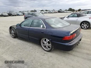 1998 Acura Integra LS with VIN JH4DB7653WS002571, listed as a Copart auction lot 73806394 with 258,143 mi miles and Salvage title. Bid and sale history available at DreamBid. Image 2.