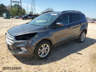 2018 Ford Escape SE with VIN 1FMCU0GD4JUD14296, listed as a Copart auction lot 50409185 with 80,700 mi miles and Salvage Title. Bid and sale history available at carsss.com. Image 1.