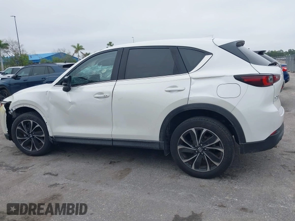 2023 Mazda CX-5 2.5 S Premium Package with VIN JM3KFBDM1P0126787, listed as a IAAI auction lot 41164586 with 12,076 mi miles. Bid and sale history available at carsss.com. Image 14.