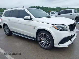 2018 Mercedes-Benz GLS 63 AMG with VIN 4JGDF7FE1JB099084, listed as a IAAI auction lot 42220385 with 97,904 mi miles and . Bid and sale history available at DreamBid. Image 1.