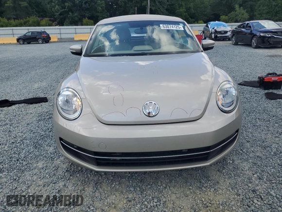 2015 Volkswagen Beetle with VIN 3VW5A7AT9FM815899, listed as a Copart auction lot 63074125 with 77,214 mi miles and Salvage title. Bid and sale history available at DreamBid. Image 5.