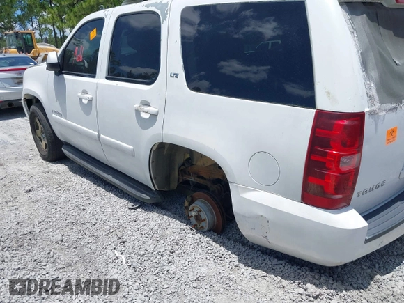 2007 Chevrolet Tahoe LTZ with VIN 1GNFC13J07J153453, listed as a IAAI auction lot 42691432 with Not provided miles and . Bid and sale history available at DreamBid. Image 15.