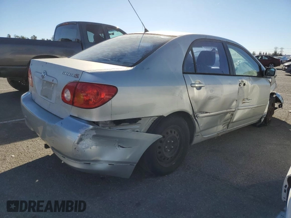 2003 Toyota Corolla CE with VIN 1NXBR32E13Z155142, listed as a Copart auction lot 79714184 with 299,999 mi miles and Salvage Title. Bid and sale history available at DreamBid. Image 3.