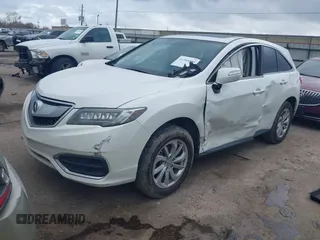 2017 Acura RDX with VIN 5J8TB3H31HL011012, listed as a IAAI auction lot 41504854 with 165,266 mi miles. Bid and sale history available at carsss.com. Image 2.