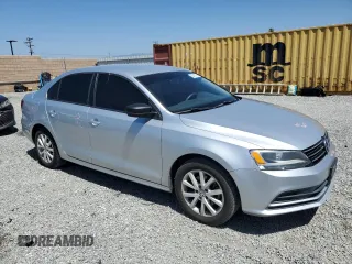 2015 Volkswagen Jetta SE z VIN 3VWD17AJ2FM263186, wystawiony jako Copart lot #57437705 z przebiegiem 106 760 mil mil oraz Szkoda całkowita • Salvage title. Historia ofert i sprzedaży dostępna na DreamBid. Obrazek 4.