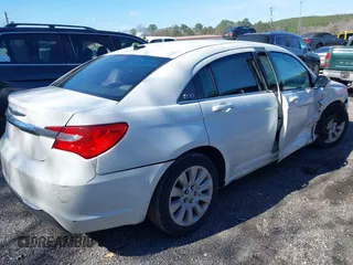 2014 Chrysler 200 LX with VIN 1C3CCBAB2EN208735, listed as a IAAI auction lot 41623000 with 104,819 mi miles and . Bid and sale history available at carsss.com. Image 4.
