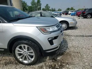 2018 Ford Explorer Limited z VIN 1FM5K8F83JGB29334, wystawiony jako Copart lot #59515225 z przebiegiem 132 040 mil mil oraz Czysty tytuł • Clean title. Historia ofert i sprzedaży dostępna na DreamBid. Obrazek 14.