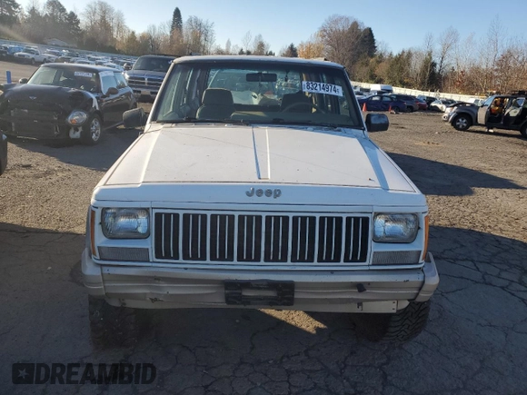 1993 Jeep Cherokee Country with VIN 1J4FJ78S0PL565292, listed as a Copart auction lot 83214974 with 233,925 mi miles and Clean Title. Bid and sale history available at carsss.com. Image 5.