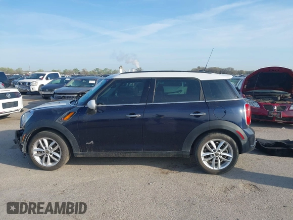 2013 MINI Countryman S ALL4 with VIN WMWZC5C58DWP33707, listed as a IAAI auction lot 41835234 with 98,441 mi miles and . Bid and sale history available at DreamBid. Image 14.