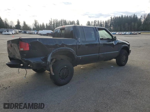 2001 GMC Sonoma SLS with VIN 1GTDT13W61K168519, listed as a Copart auction lot 50601565 with 0 mi miles and Salvage Title. Bid and sale history available at carsss.com. Image 3.