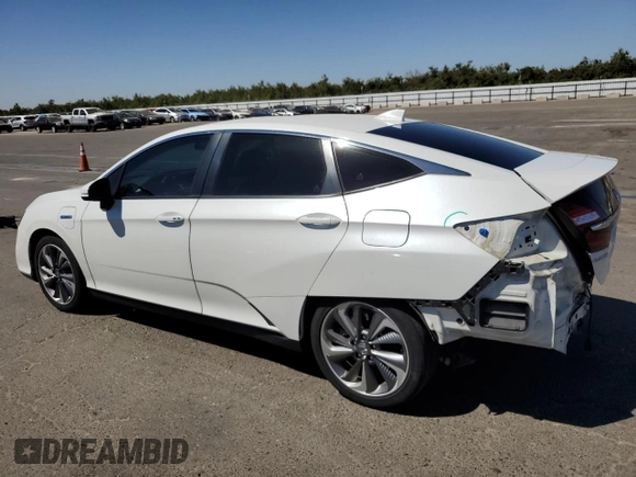 2018 Honda Clarity Plug-In Hybrid with VIN JHMZC5F11JC013897, listed as a Copart auction lot 68315094 with 99,486 mi miles and Salvage Title. Bid and sale history available at carsss.com. Image 2.