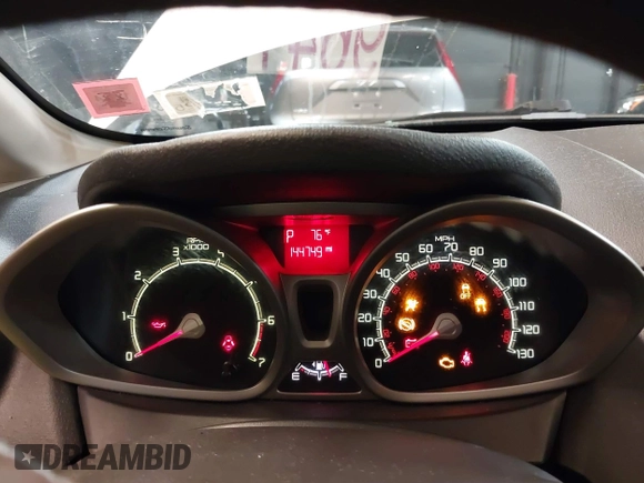 2012 Ford Fiesta SE with VIN 3FADP4BJ1CM110315, listed as a IAAI auction lot 39266357 with 144,749 mi miles. Bid and sale history available at carsss.com. Image 7.
