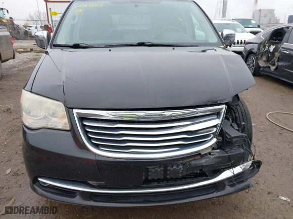 2013 Chrysler Town & Country Touring-L with VIN 2C4RC1CG8DR809559, listed as a IAAI auction lot 41468926 with 182,236 mi miles. Bid and sale history available at carsss.com. Image 13.