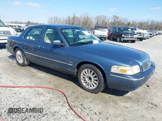 2009 Mercury Grand Marquis LS with VIN 2MEHM75VX9X632358, listed as a IAAI auction lot 41618591 with 101,765 mi miles. Bid and sale history available at carsss.com. Image 1.