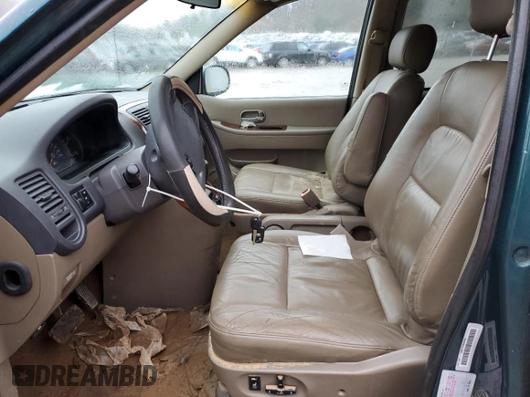 2003 Kia Sedona LX with VIN KNDUP131036440504, listed as a Copart auction lot 45048015 with 75,507 mi miles and Salvage Title. Bid and sale history available at carsss.com. Image 7.
