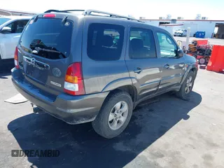 2003 Mazda Tribute ES with VIN 4F2CZ96113KM52877, listed as a IAAI auction lot 42217251 with 218,475 mi miles and . Bid and sale history available at DreamBid. Image 4.