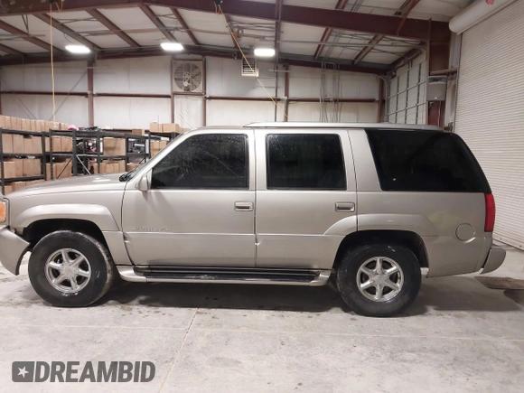 1999 Cadillac Escalade z VIN 1GYEK13RXXR413480, wystawiony jako IAAI lot #41552688 z przebiegiem 214 501 mil mil oraz . Historia ofert i sprzedaży dostępna na DreamBid. Obrazek 14.
