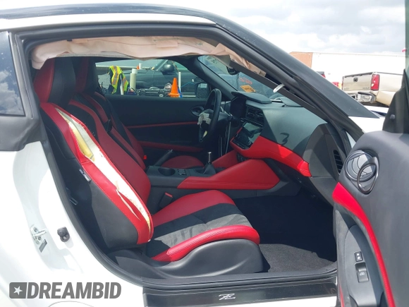2024 Nissan Z Performance with VIN JN1BZ4BH1RM361447, listed as a IAAI auction lot 41903275 with 9,574 mi miles and . Bid and sale history available at DreamBid. Image 5.