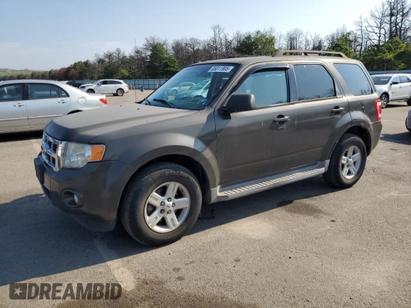 2011 Ford Escape Hybrid with VIN 1FMCU4K35BKA16469, listed as a Copart auction lot 65811905 with 401,583 mi miles and Clean title. Bid and sale history available at DreamBid. Image 1.