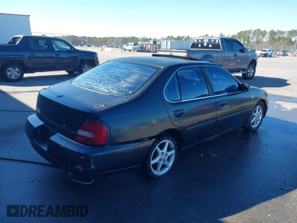 2001 Nissan Altima GXE with VIN 1N4DL01A11C157221, listed as a IAAI auction lot 41702378 with 206,648 mi miles. Bid and sale history available at carsss.com. Image 4.