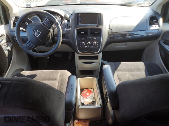 2014 Dodge Grand Caravan American Value with VIN 2C4RDGBG5ER260339, listed as a Copart auction lot 54533055 with 188,952 mi miles and Clean Title. Bid and sale history available at DreamBid. Image 8.