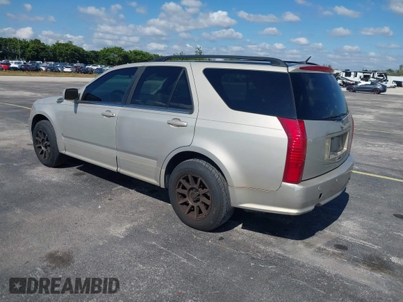 2008 Cadillac SRX AWD with VIN 1GYEE637280101842, listed as a IAAI auction lot 41417596 with 125,052 mi miles. Bid and sale history available at carsss.com. Image 3.