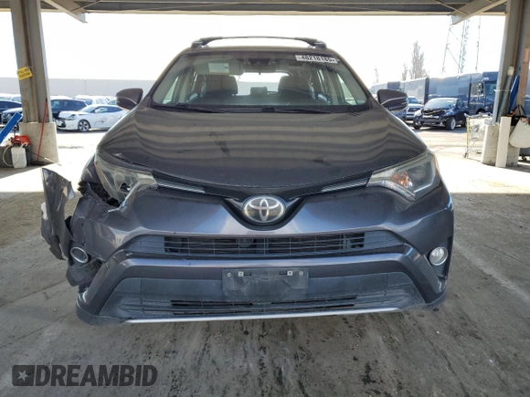 2018 Toyota RAV4 XLE with VIN JTMRFREV5JJ739620, listed as a Copart auction lot 48218185 with 82,885 mi miles and Salvage Title. Bid and sale history available at DreamBid. Image 5.