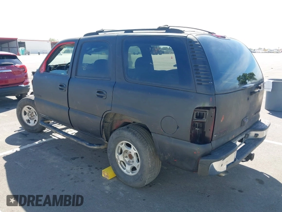 2002 Chevrolet Tahoe LS with VIN 1GNEC13T12R214901, listed as a IAAI auction lot 41868281 with Not provided miles and . Bid and sale history available at DreamBid. Image 3.