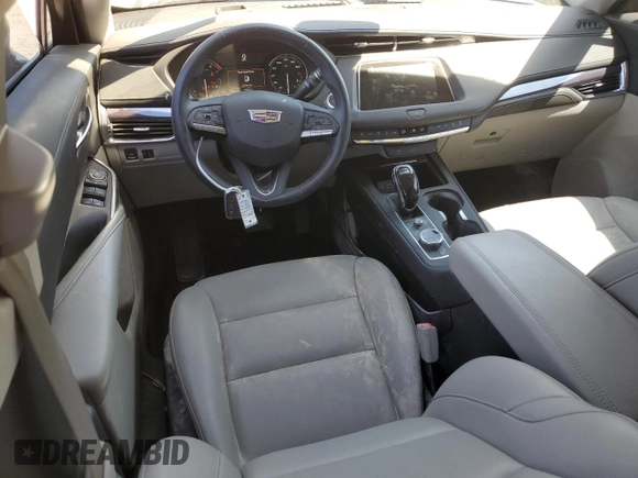 2023 Cadillac XT4 FWD Luxury z VIN 1GYAZAR46PF178003, wystawiony jako Copart lot #52024665 z przebiegiem 42 000 mil mil oraz Szkoda całkowita • Salvage title. Historia ofert i sprzedaży dostępna na DreamBid. Obrazek 8.