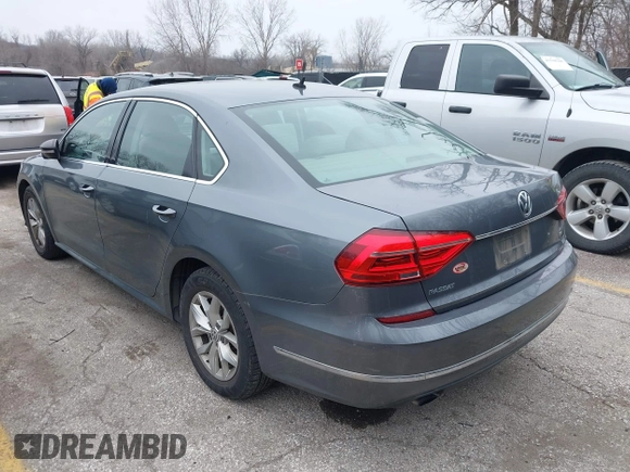 2016 Volkswagen Passat S z VIN 1VWAS7A31GC052520, wystawiony jako IAAI lot #41547408 z przebiegiem 129 730 mil mil oraz . Historia ofert i sprzedaży dostępna na DreamBid. Obrazek 3.