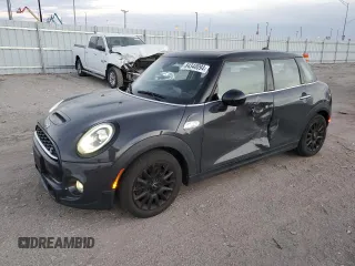 2019 MINI Hardtop 4 Door Cooper S with VIN WMWXU3C56K2H86633, listed as a Copart auction lot 84340094 with 67,712 mi miles and Salvage Title. Bid and sale history available at DreamBid. Image 1.