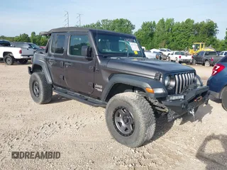 2021 Jeep Wrangler Unlimited Sport S with VIN 1C4HJXDNXMW610618, listed as a IAAI auction lot 41127373 with 60,264 mi miles and . Bid and sale history available at DreamBid. Image 1.